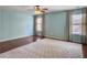 Spacious bedroom with hardwood floors, ceiling fan and neutral walls at 173 Hainsworth Dr, North Charleston, SC 29418