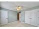 Spacious bedroom with double closets and neutral walls at 173 Hainsworth Dr, North Charleston, SC 29418