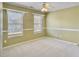 Charming bedroom with neutral walls, carpet, and built-in shelves at 173 Hainsworth Dr, North Charleston, SC 29418