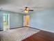 Serene bedroom with hardwood floors, ceiling fan, and en-suite bathroom at 173 Hainsworth Dr, North Charleston, SC 29418