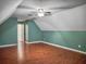 Spacious bonus room with wood flooring and vaulted ceiling at 173 Hainsworth Dr, North Charleston, SC 29418