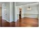 Hardwood floor dining room with view into kitchen at 173 Hainsworth Dr, North Charleston, SC 29418