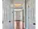 White door entryway with hardwood floors at 173 Hainsworth Dr, North Charleston, SC 29418