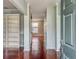 Bright entryway with hardwood floors and built-in shelves at 173 Hainsworth Dr, North Charleston, SC 29418