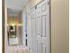 Upper hallway with mirrored wall, carpet, and built-in storage at 173 Hainsworth Dr, North Charleston, SC 29418