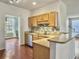 Eat-in kitchen with granite countertops, stainless steel appliances, and wood cabinets at 173 Hainsworth Dr, North Charleston, SC 29418