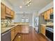 Kitchen boasts stainless steel appliances and granite countertops at 173 Hainsworth Dr, North Charleston, SC 29418