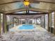 Indoor view of screened-in pool area with tile floor at 173 Hainsworth Dr, North Charleston, SC 29418