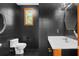 Bathroom with dark tile and updated vanity at 2942 Seabrook Island Rd, Seabrook Island, SC 29455