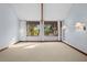 Spacious bedroom with large windows and wood beams at 2942 Seabrook Island Rd, Seabrook Island, SC 29455