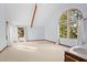 Main bedroom with vaulted ceiling and large windows at 2942 Seabrook Island Rd, Seabrook Island, SC 29455