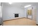 Bonus room with hardwood floors, fireplace and large windows at 2942 Seabrook Island Rd, Seabrook Island, SC 29455