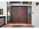 Double wooden doors with intricate detailing at 2942 Seabrook Island Rd, Seabrook Island, SC 29455