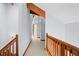 Bright hallway with carpeted floors and wooden accents at 2942 Seabrook Island Rd, Seabrook Island, SC 29455