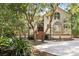 Front view of house with circular driveway and landscaping at 2942 Seabrook Island Rd, Seabrook Island, SC 29455