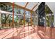 Spacious living area with vaulted ceilings, large windows, and tile floors at 2942 Seabrook Island Rd, Seabrook Island, SC 29455