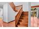 Elegant wooden staircase leading to upper level at 2942 Seabrook Island Rd, Seabrook Island, SC 29455