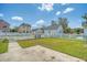 Fenced backyard with concrete patio and lush lawn at 307 Pimpernel St, Summerville, SC 29483