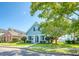 Cute light blue house with a front porch and nicely landscaped yard at 307 Pimpernel St, Summerville, SC 29483