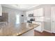 Kitchen boasts granite countertops and stainless steel appliances at 307 Pimpernel St, Summerville, SC 29483