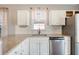 Modern kitchen with granite countertops and stainless steel appliances at 307 Pimpernel St, Summerville, SC 29483