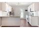 Bright kitchen with granite countertops, stainless steel appliances, and white cabinets at 307 Pimpernel St, Summerville, SC 29483