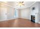 Living room with hardwood floors, fireplace, and ceiling fan at 307 Pimpernel St, Summerville, SC 29483