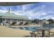 Community pool with clubhouse and seating area at 307 Pimpernel St, Summerville, SC 29483