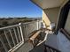 Relaxing balcony boasting scenic water views and comfortable outdoor furniture at 3701 Dock Site Rd # 205, Edisto Beach, SC 29438