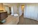 Bedroom with a dresser and access to a bathroom at 3701 Dock Site Rd # 205, Edisto Beach, SC 29438