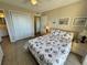 Bright bedroom with a seashell comforter and ocean views at 3701 Dock Site Rd # 205, Edisto Beach, SC 29438