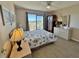 Main bedroom with king-size bed, water views, and ample closet space at 3701 Dock Site Rd # 205, Edisto Beach, SC 29438