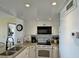 Bright kitchen featuring granite countertops and white cabinets at 3701 Dock Site Rd # 205, Edisto Beach, SC 29438
