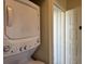 Stackable washer and dryer in a well-lit laundry room at 3701 Dock Site Rd # 205, Edisto Beach, SC 29438
