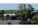 Scenic view of marsh grasses, water, and distant buildings at 3701 Dock Site Rd # 205, Edisto Beach, SC 29438