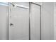 Clean white tiled shower with glass enclosure at 428 Grove End Rd, Moncks Corner, SC 29461