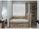 Bathroom with soaking tub, walk-in shower, and tile at 5382 Westchester Pl, North Charleston, SC 29418