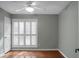 Well-lit bedroom, hardwood floors and plantation shutters at 5382 Westchester Pl, North Charleston, SC 29418