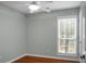 Charming bedroom with hardwood floors and a window at 5382 Westchester Pl, North Charleston, SC 29418