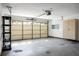 Attached garage with storage cabinets and shelving at 5382 Westchester Pl, North Charleston, SC 29418