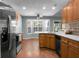 Open kitchen with a large island and stainless steel appliances at 5382 Westchester Pl, North Charleston, SC 29418