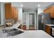 Kitchen with stainless steel appliances and light-colored wood cabinets at 5382 Westchester Pl, North Charleston, SC 29418