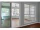 Sunroom with tile flooring and access to the backyard at 5382 Westchester Pl, North Charleston, SC 29418