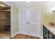 Bathroom with shower, tiled walls, and wood flooring at 732 Spinnaker Beachhouses, Seabrook Island, SC 29455