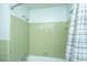 Bathroom with shower/tub and green tile at 100 Hounds Run, Goose Creek, SC 29445