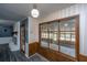 Bright dining area with view of sunroom and fireplace at 100 Hounds Run, Goose Creek, SC 29445