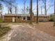 Brick house with a spacious backyard and mature trees at 105 Gambels Ln, Summerville, SC 29485