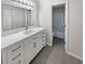 Updated bathroom with white vanity and tile floor at 105 Gambels Ln, Summerville, SC 29485