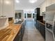 Modern kitchen with butcher block countertops and stainless steel appliances at 105 Gambels Ln, Summerville, SC 29485