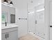 Bright bathroom with sleek vanity, glass shower and modern fixtures at 1137 Happyland Blvd, Mount Pleasant, SC 29466